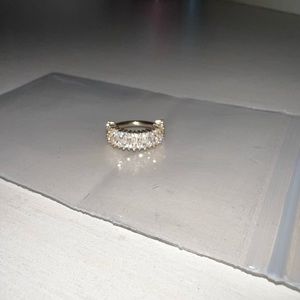 14k gold diamond earring, one single hoop.